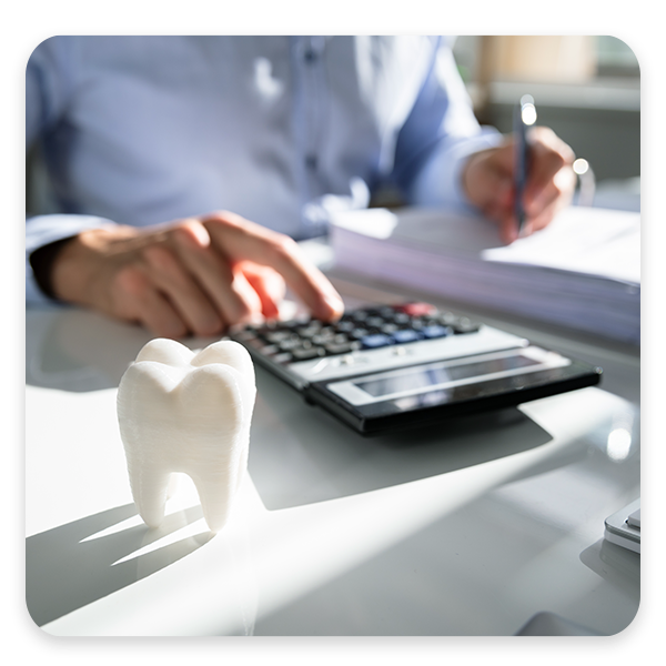 Person calculating cost of periodontal care
